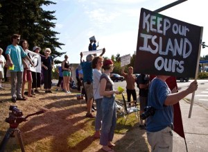 Roughly 50 citizens and activists gathered at the corner of High School Road and Highway 305 to show support for the nearby tree sit by Bainbridge teen