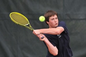 BHS senior Ryan Hunt hits a return during the No. 2 boys doubles match against Seattle Prep. Hunt and Dylan Skeffington fell 6-2