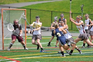 Bainbridge Delaney Larkin (#3) fires a shot past Lakeside goaltender Madeline Hurlbutin the state championships Saturday at the Eastside Catholic.