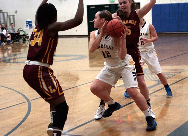 Spartan senior post Kayla Buchmeier looks for a teammate to pass to during Wednesday's game against Lakeside.
