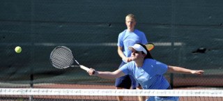 Carolyn McCotter and Tim Buxton face off against Seattle Prep in mixed doubles.