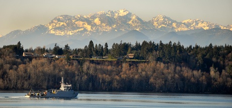 A torpedo tender makes its way back to Keyport under clear