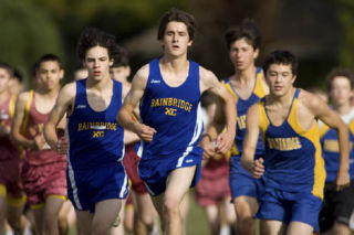 BHS boys cross-country runners depart the starting line during their meet at Battle Point Park last Wednesday afternoon.