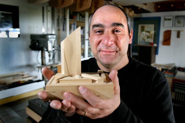 Model maker Alec Vassiliadis has spent the better part of 28 years creating miniature models of clients’ building projects.