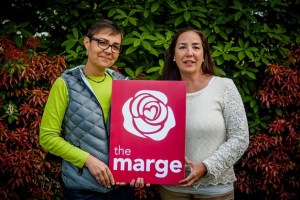 Bainbridge artist Alex Sanso and Kassia Sing with the Marge Williams Center’s new logo. The center celebrates its 15th anniversary with a community open house at 1 p.m. Saturday
