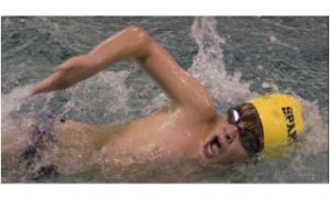 BHS sophomore Sam Zuckerman slices through Friday at Ray Williamson pool.  The Spartans bested O’Dea during home action.
