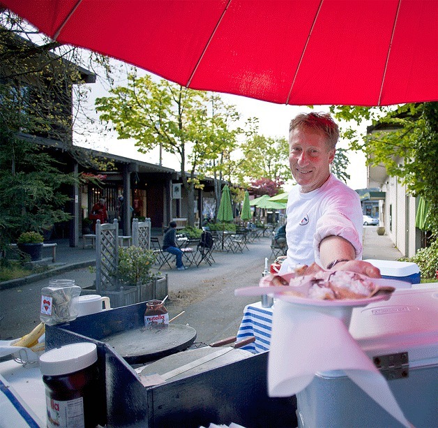 J’aime les Crepes owner Paul Pluska cooked for visitors to the Bainbridge Island farmers market outside of his new Madrone Lane shop location