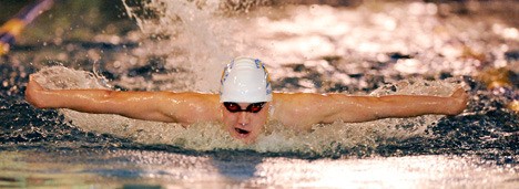 Bainbridge sophomore Andrew McCarthy competes in the 100-yard butterfly on Dec. 18.