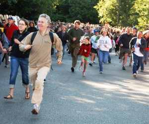 Shoppers make a mad dash for bargains at the start of an earlier Rotary Auction and Rummage Sale.