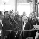 Andrea Savage photo                                Realogics Sotheby&rsquo;s vice president Stacy Jones prepares to cut the ribbon at the opening of the real estate firm&rsquo;s new Island Living Gallery.