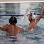 Luciano Marano | Bainbridge Island Review                                Bainbridge senior Tristan Maass in the pool against Bellevue during Game 1 of the boys water polo state tournament last week.