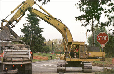 Intersection destruction commenced Monday morning at High School Road and Madison Avenue for roundabout construction. Detours will redirect traffic around the normally busy intersection for the next three weeks.