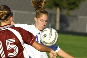 Defender Heather Peck fights for the ball in early season play.