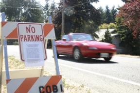 Temporary parking restriction recently imposed by the city on the east side of Grow Avenue have only served to move scofflaws to other parts of the street