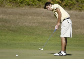 Paul DeBarros putts one in at the first hole. The senior was the medalist for the match as he shot a two under par.