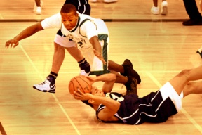 Steven Gray looks for a teammate after he grabs a loose ball. The senior scored 36 points as Bainbridge defeated Clover Park 65-33.