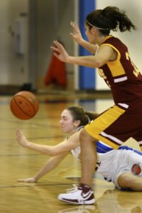 Spartan guard Emily Farrar loses the ball during Wednesday’s game against Lakeside. The junior scored 11 points
