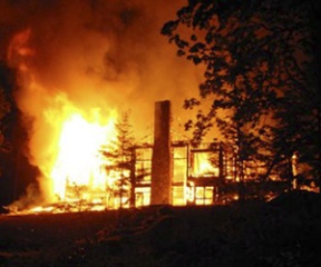 An unfinished Battle Point home burns late Saturday.