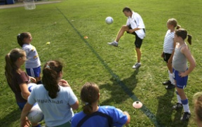 Seattle Sounders forward Cam Weaver shows his skills to the GU12 Force soccer team Monday.