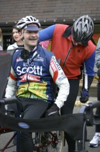 Ernie Franz prepares to set out on a tandem bicycle