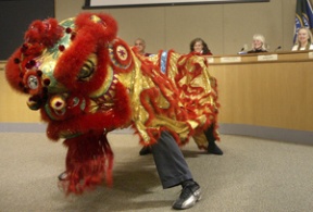 A dragon heralding the Chinese New Year performs for the City Council during a recent meeting at City Hall. The dragon will be among the celebrants at downtown festivities set for Jan. 29.