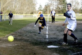Bainbridge shortstop Cara Thompson makes her way to home plate