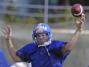 Spartan quarterback Quinton Agosta throws during practice at Bainbridge High School.
