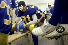 BHS junior Fiore Alailima reflects on the first half in the Spartan locker room during halftime Friday.