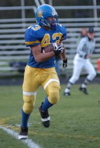 Max Kauffman runs out his interception catch in the opening minute of play.
