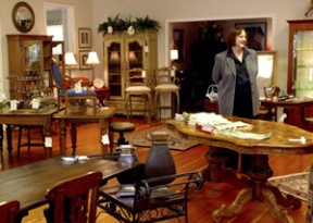 The Iron Gate is a treasure trove of antiques and new pieces arranged in room settings. Ruth Devine (shown) and Erin Wyatt offer expert service and provide back stories for their items. They encourage visitors to make themselves at home.