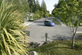 The island’s own grassy knoll separates Ericksen Avenue from Hildebrand Lane – but for how much longer? A connection could be in the works.