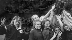 Laurie Usher (left) celebrates a championship with her Bainbridge girls lacrosse team in 1996.