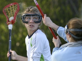 Senior co-captain Colbi Brawner tries to pass during practice Tuesday.