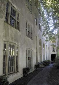 The classical revial design of the historic Moran School building can be seen in such architectural details as arched windows.