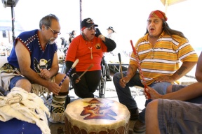 Steve Old Coyote (left) performs with other drummers during the Chief Seattle Days in Suquamish. The family is hosting a Thanksgiving celebration Saturday.