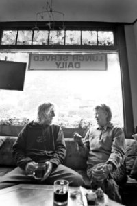 Coffee Clatch members John Mills and Marlys Burnett chat at the Pegasus Coffee Shop on Tuesday morning. The popular establishment was purchased by Jocelyn and Jeff Waite this week.