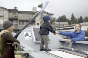 Dylan LeValley (right) shakes hands with Theo Monnin (center)