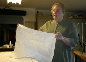 Susan Goodwin used linen fabric to craft 11 miniature sails for a model of Capt. Vancouver’s vessel Discovery