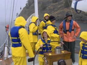 (Above) With the help of her classmates and the Salish crew