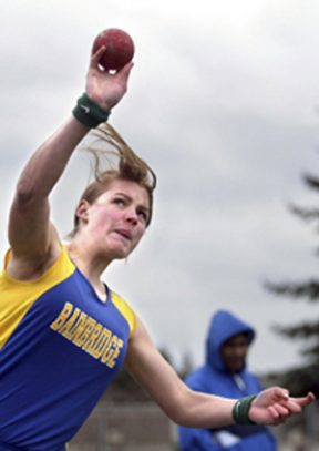 Theresa Johansen competes in the shot put at Thursday’s track meet at BHS. She finished third in the event with a distance of 27 feet