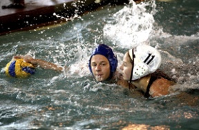 Senior Anne Scott keeps the ball away from Mercer Island’s Christina Weed at Friday’s game. Scott scored four times and had two assists in the contest.