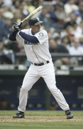 Better known behind the plate than at it