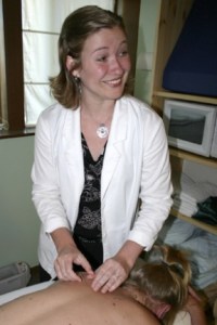 Acupuncturist Halin Zindell inserts needles that will tonify the patient’s organs.