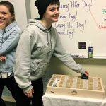 Eagle Harbor High teacher, BARN woodworker create cellphone caddy to minimize classroom distractions