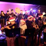 PHOTO GALLERY | A season’s soggy start: Rain did nothing to dampen holiday tree lighting tradition