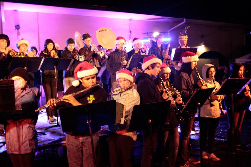 PHOTO GALLERY | A season’s soggy start: Rain did nothing to dampen holiday tree lighting tradition