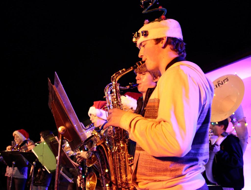 PHOTO GALLERY | A season’s soggy start: Rain did nothing to dampen holiday tree lighting tradition
