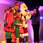PHOTO GALLERY | A season’s soggy start: Rain did nothing to dampen holiday tree lighting tradition