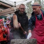Luciano Marano | Bainbridge Island Review                                Shoichi Sugiyama, the longtime mochi tsuki master instructor and a staple figure at the annual Bainbridge Island Japanese American Community&rsquo;s mochi tsuki festival, instructs Matt Sanford, of Seattle, in the proper method of rice mashing last weekend.