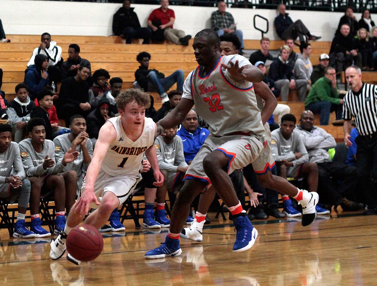 Luciano Marano | Bainbridge Island Review                                Spartan senior Lyle Terry looks for a gap in Tuesday night&rsquo;s game against Nathan Hale.